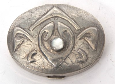 Lot 150 - A pewter mounted ladies compact of oval form...