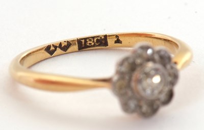 Lot 19 - An 18ct diamond cluster ring, comprised of old...