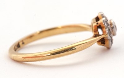Lot 19 - An 18ct diamond cluster ring, comprised of old...