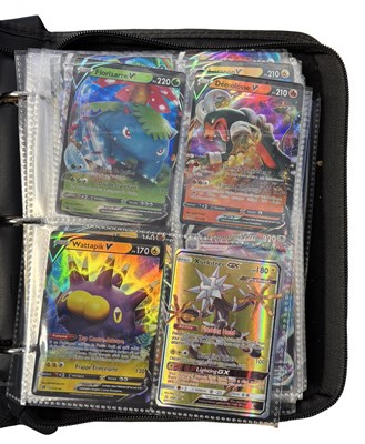 Lot 182 - A folder of contemporary holographic Pokemon...
