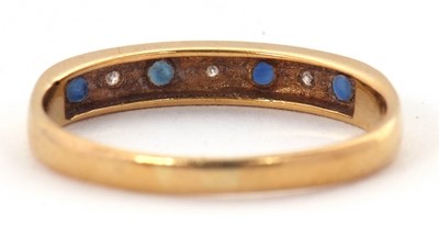 Lot 9 - A 18ct sapphire and diamond ring, with...