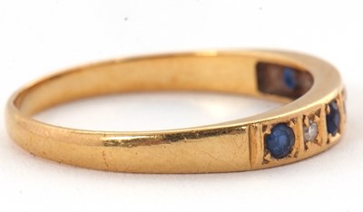 Lot 9 - A 18ct sapphire and diamond ring, with...