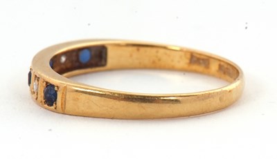 Lot 9 - A 18ct sapphire and diamond ring, with...