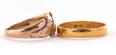 Lot 77 - A 22ct wedding band, (hallmark worn), size P,...