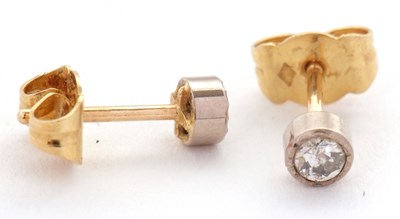 Lot 93 - A pair of unmarked diamond earstuds, each...