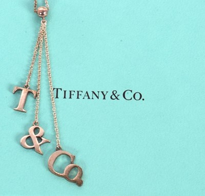 Lot 140 - Tiffany & Co: a silver Letter Drop necklace,...