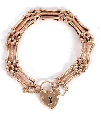 Lot 178 - A 9ct gate bracelet, with plain and textured...
