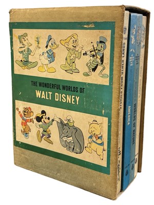 Lot 22 - THE WONDERFUL WORLDS OF WALT DISNEY 4-volumes...