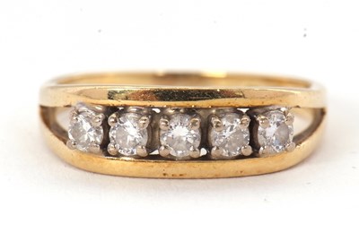 Lot 53 - An 18ct diamond ring, set with five round...