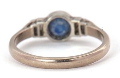 Lot 66 - An 18ct and platinum sapphire and diamond ring,...
