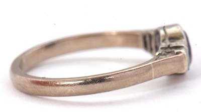 Lot 66 - An 18ct and platinum sapphire and diamond ring,...