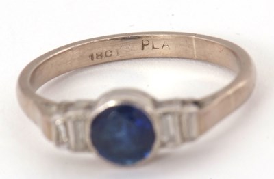 Lot 66 - An 18ct and platinum sapphire and diamond ring,...