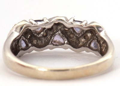 Lot 61 - A 9ct diamond and tanzanite ring, set with...