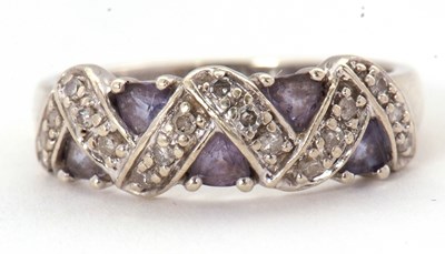 Lot 61 - A 9ct diamond and tanzanite ring, set with...