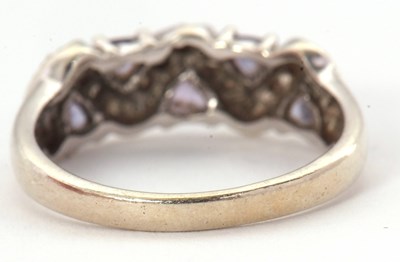 Lot 61 - A 9ct diamond and tanzanite ring, set with...