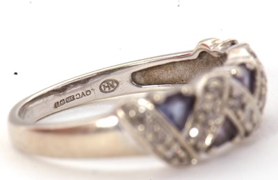 Lot 61 - A 9ct diamond and tanzanite ring, set with...
