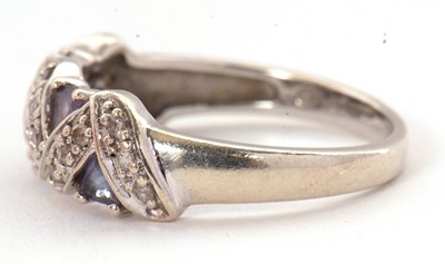 Lot 61 - A 9ct diamond and tanzanite ring, set with...