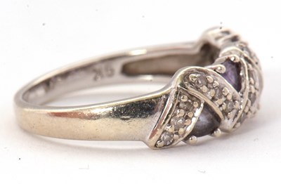 Lot 61 - A 9ct diamond and tanzanite ring, set with...