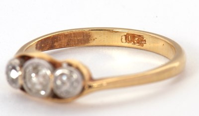 Lot 63 - A three stone diamond ring, set with three...