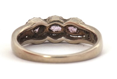 Lot 65 - A 9ct pink stone and diamond ring, set with...
