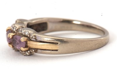 Lot 65 - A 9ct pink stone and diamond ring, set with...