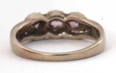 Lot 65 - A 9ct pink stone and diamond ring, set with...