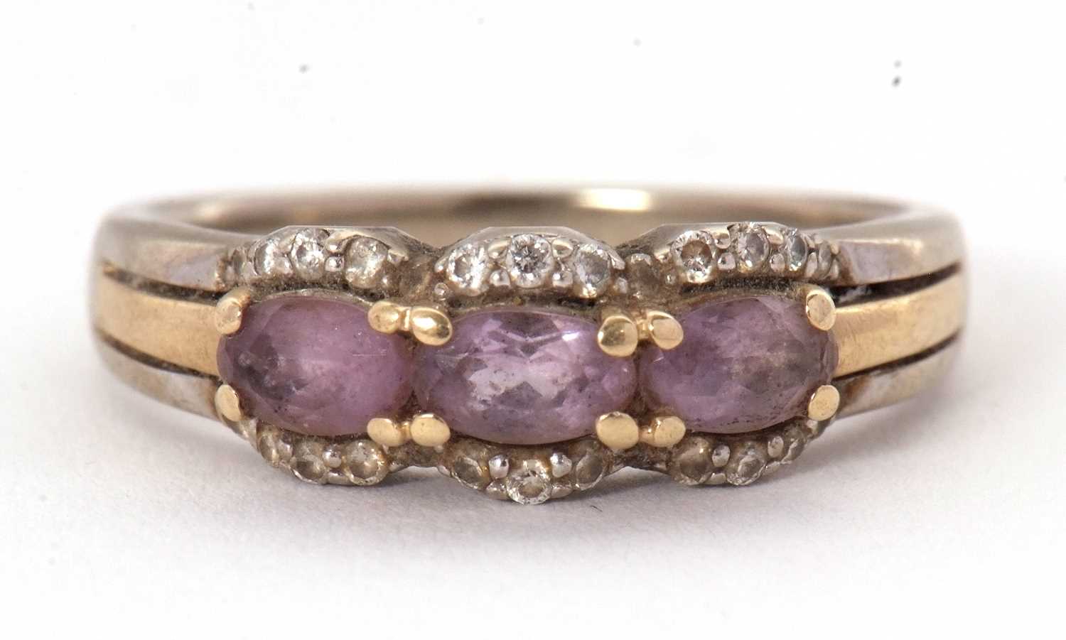 Lot 65 - A 9ct pink stone and diamond ring, set with...