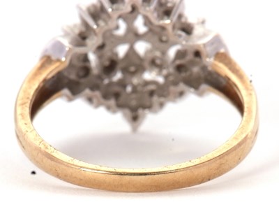 Lot 15 - A 9ct diamond cluster ring, the frame set with...