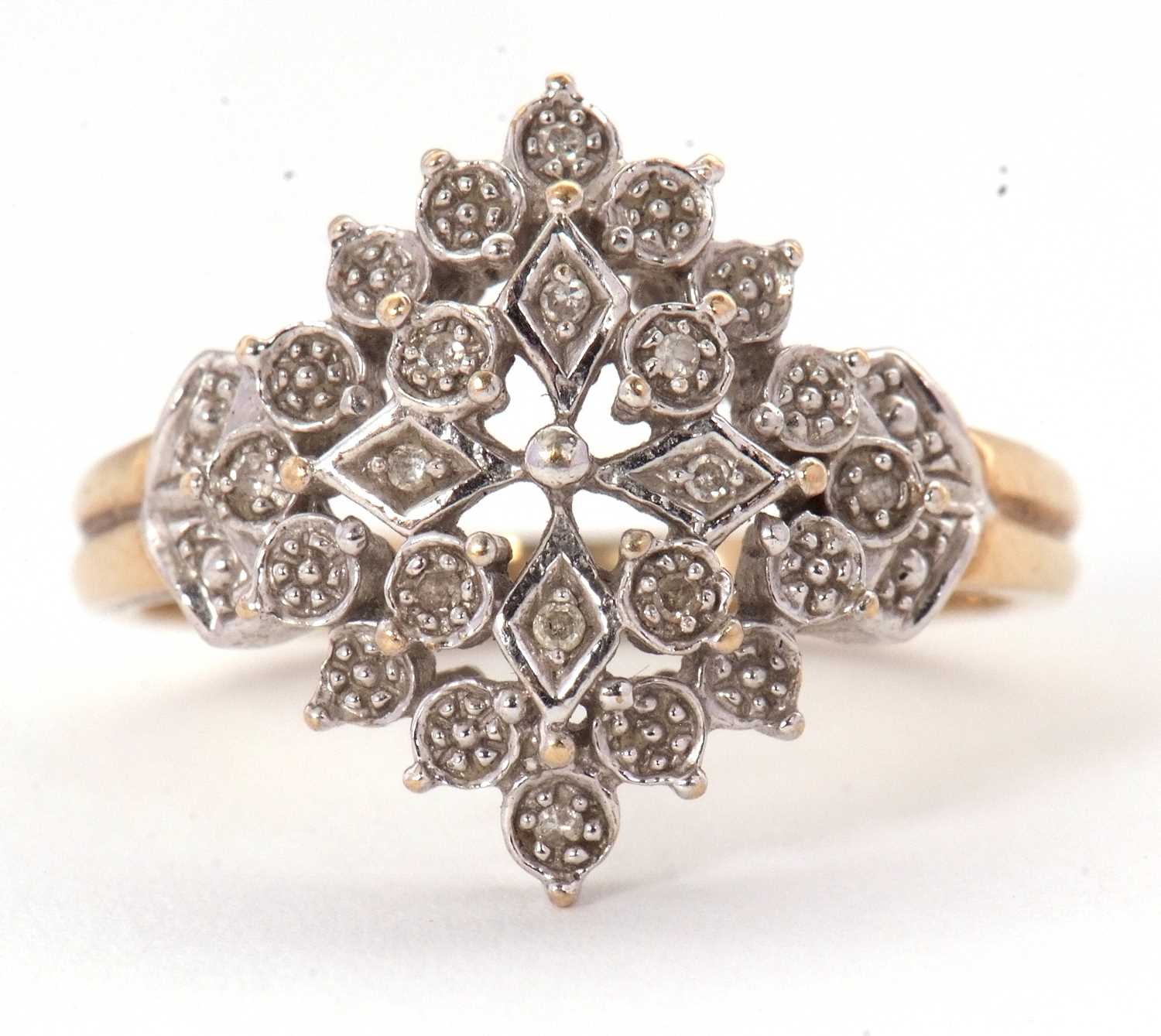 Lot 15 - A 9ct diamond cluster ring, the frame set with...