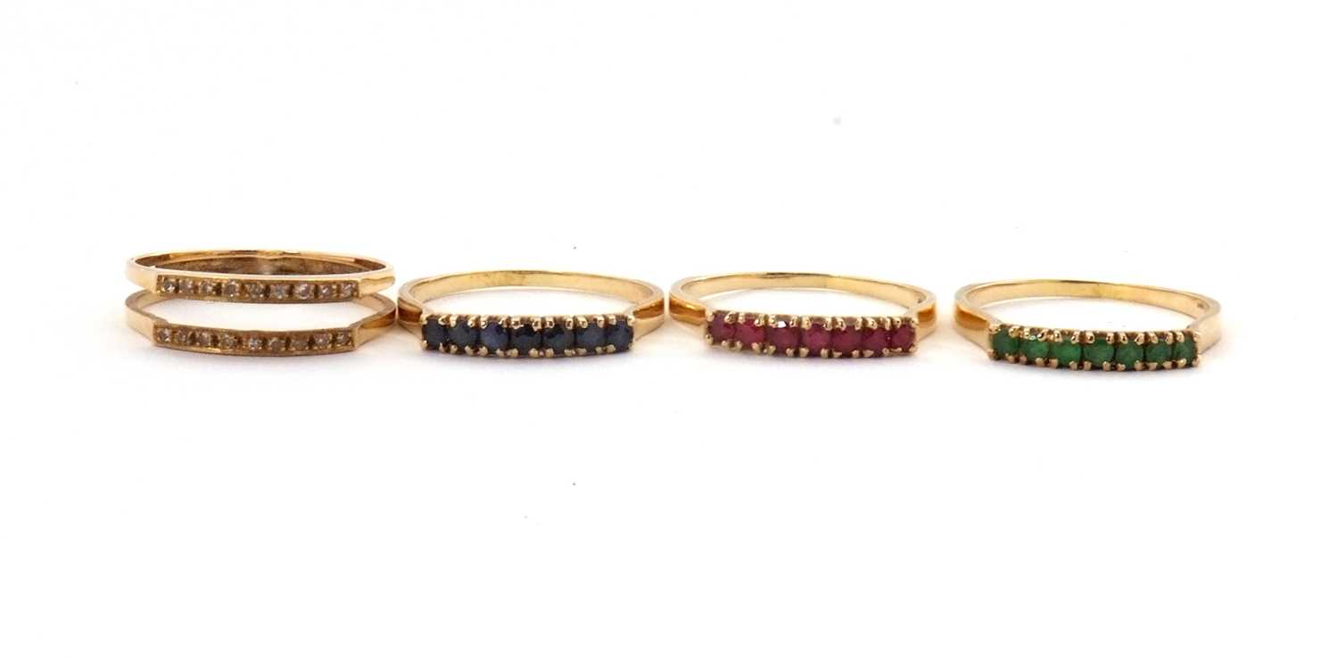 Lot 10 - A 14K interchangeable gemset ring, the two row...