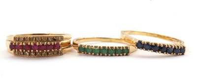 Lot 10 - A 14K interchangeable gemset ring, the two row...