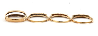 Lot 10 - A 14K interchangeable gemset ring, the two row...