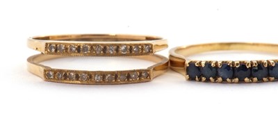 Lot 10 - A 14K interchangeable gemset ring, the two row...