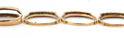 Lot 10 - A 14K interchangeable gemset ring, the two row...