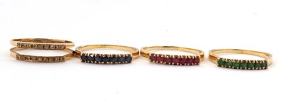 Lot 10 - A 14K interchangeable gemset ring, the two row...