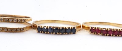 Lot 10 - A 14K interchangeable gemset ring, the two row...