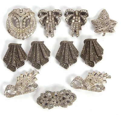 Lot 211 - A quantity of dress clips and brooches,:...