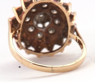 Lot 70 - A 9ct diamond cluster ring, set with round...