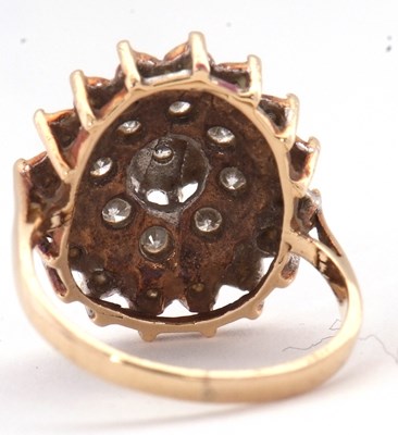 Lot 70 - A 9ct diamond cluster ring, set with round...
