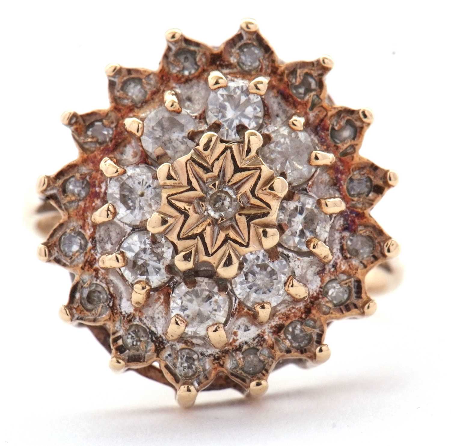 Lot 70 - A 9ct diamond cluster ring, set with round...