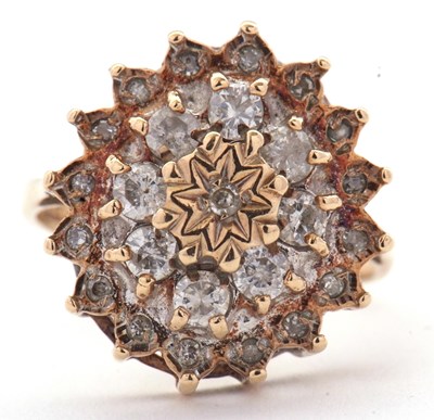 Lot 70 - A 9ct diamond cluster ring, set with round...