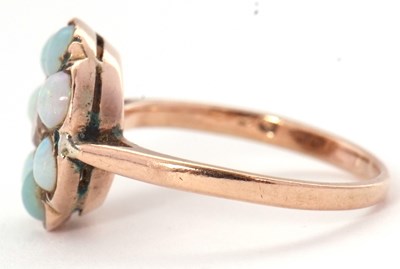 Lot 71 - An opal and diamond ring, the central round...