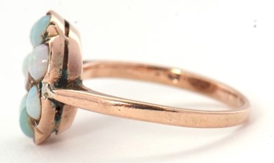 Lot 71 - An opal and diamond ring, the central round...