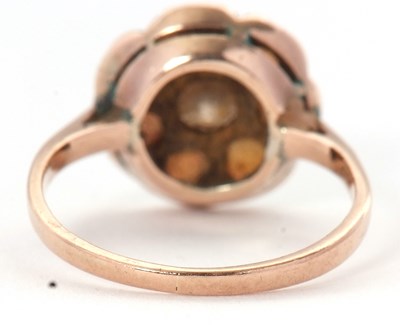 Lot 71 - An opal and diamond ring, the central round...