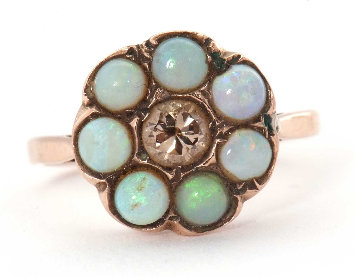 Lot 71 - An opal and diamond ring, the central round...