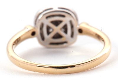 Lot 36 - An 18ct diamond ring, the central panel set...