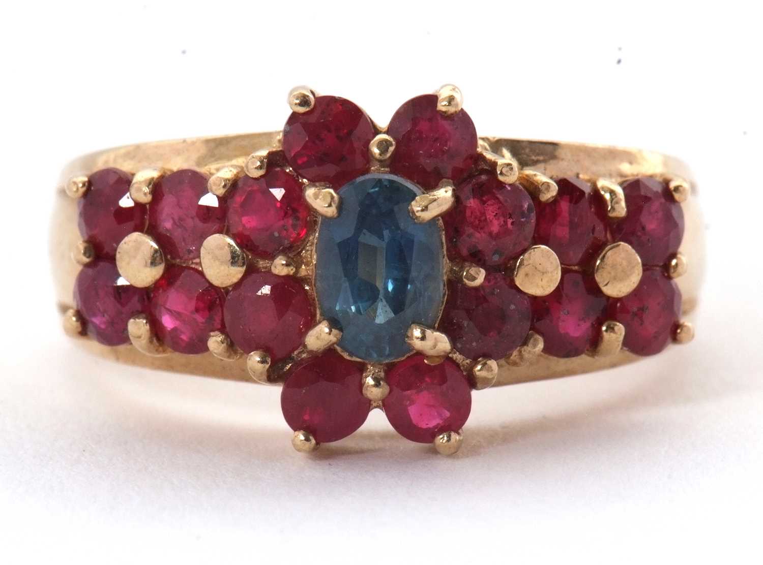 Lot 40 - A 9ct ruby and sapphire ring, set with an oval...