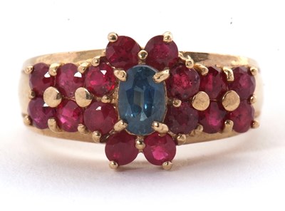 Lot 40 - A 9ct ruby and sapphire ring, set with an oval...