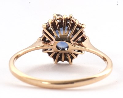 Lot 47 - A 9ct sapphire and diamond ring, the oval...