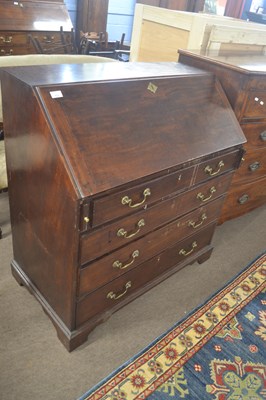 Lot 551 - A George III mahogany bureau of typical form...